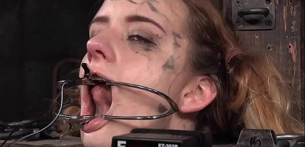  Teen sub dominated with open mouth gags